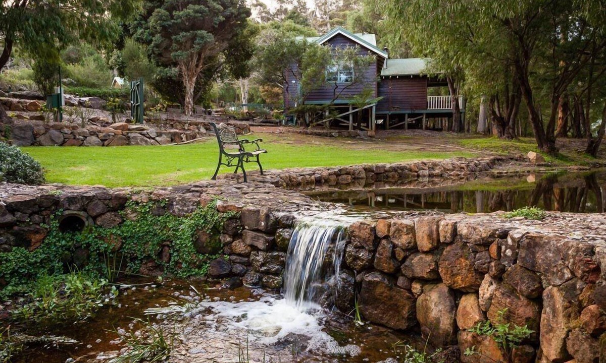 Margaret River Ski Chalet | 2 Bedroom Chalet offers 2 separate bedrooms with a large living/dining area and balcony.