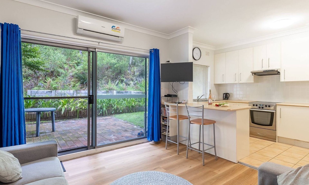 Shoal Bay Apartment | Adriana, 4/83 Ronald Avenue - open plan living with backyard