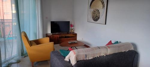 Cayenne Apartment | Appartement NANA A 34 - Appartement Cosy et Lumineux - Vue Panoramique- Centre ville- - Cuisine équipée- CLIM- WIFI - NETFLIX-Parking Public Gratuit-Garage privé payant