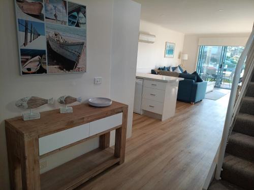 Paynesville Apartment | Captains Cove Resort - Waterfront Apartments