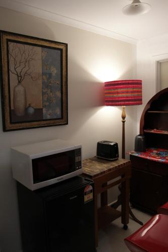 Malmsbury House | Cottage room with ensuite and kitchenette