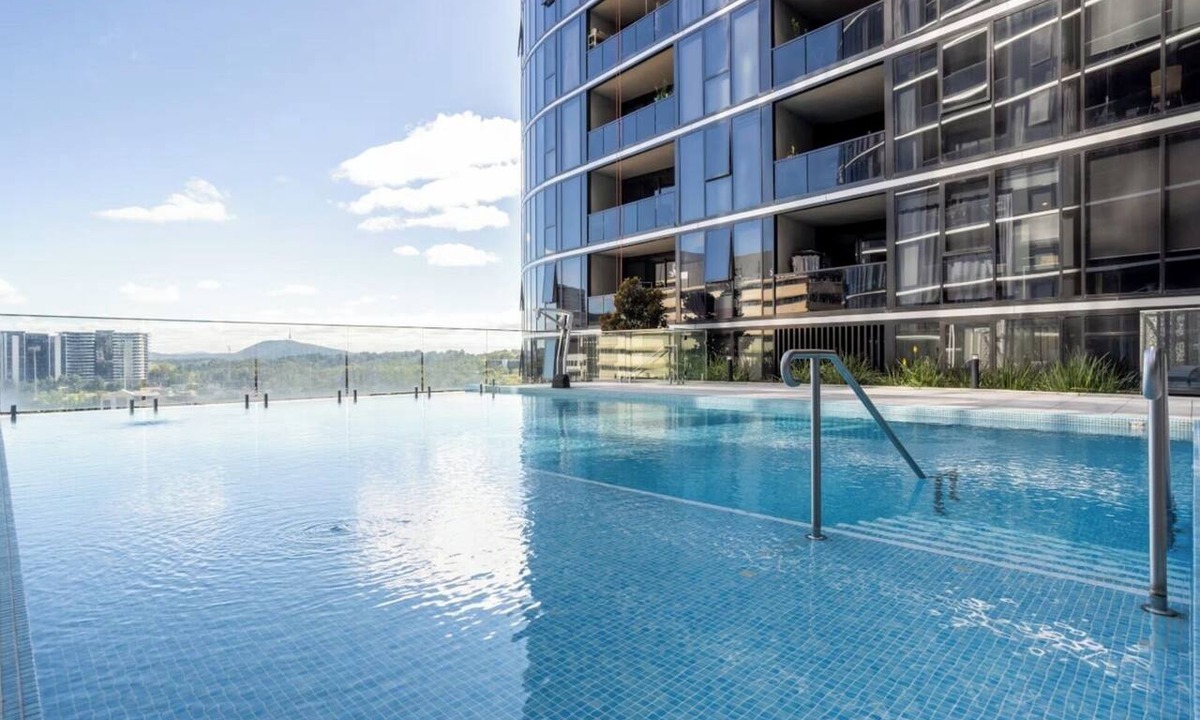 Phillip Apartment | Elegant 2BR Retreat with Pool, Parking and Balcony