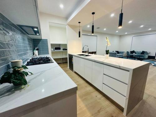 Plumpton House | Ghani Holiday Home in Melbourne West