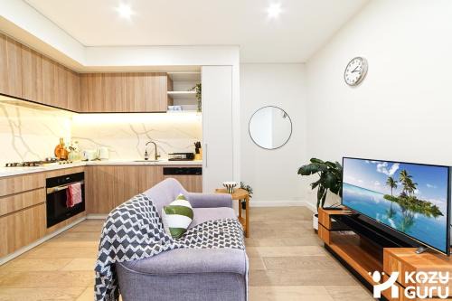 Burwood Apartment | KozyGuru | Burwood | Harbour Bridge-View Apt