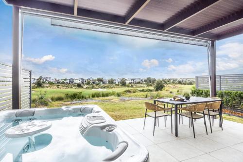 Magenta Shores House | Magenta Dunes a 3BR lux golf retreat w/Spa & Resort facilities