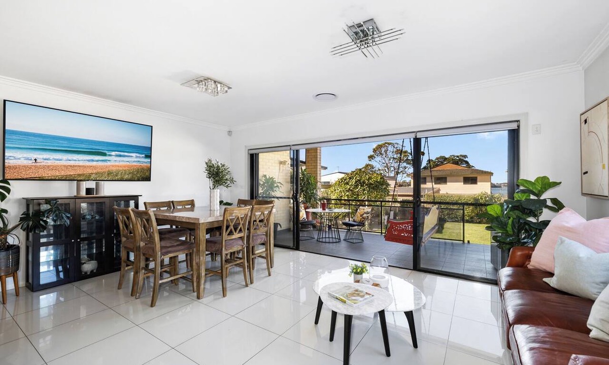 Rhodes House | Modern Rhodes Family Home with BBQ, Balcony & Two Living Areas