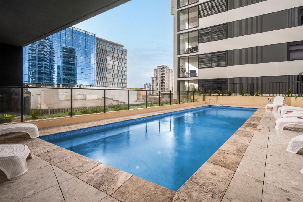 Newcastle West Apartment | Prestige 2BR Stay with Ocean Views - Rooftop and Cinema
