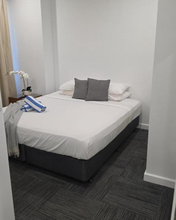 Darwin City Centre Apartment | Stylish Resort Stay with King Bed, Pool and Outdoor Patio