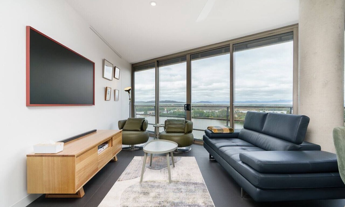 City West Apartment | Stylish Top-Floor Apt with Lake and Mountain Views