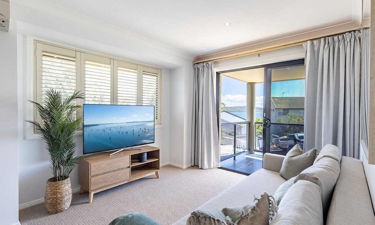 Salamander Bay House | The Bach, 1/28 Scott Circuit - water views, Wi-Fi and Air Conditioning