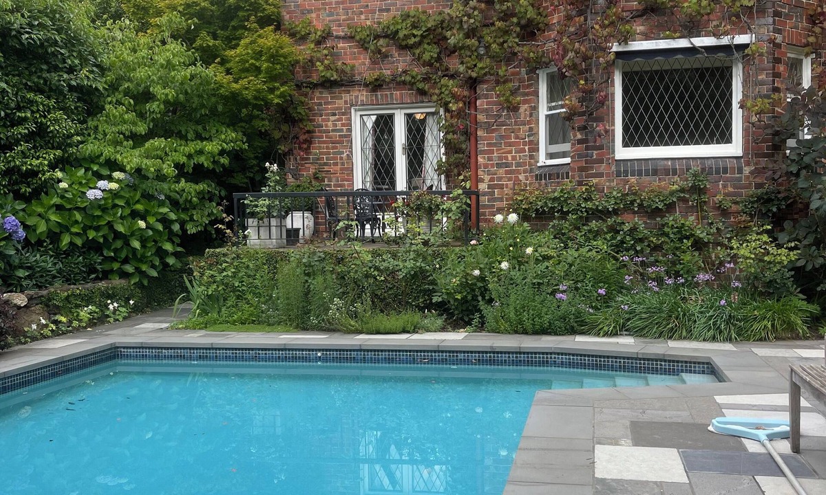 Toorak House | Toorak Tudor Family Home with modern kitchen and 1930's charm.
