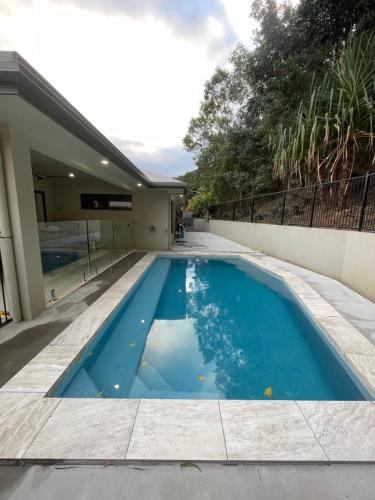 Trinity Beach House | Trinity Beach Haven - Luxury 4 Bedroom Home with Pool, Steps to the Beach, Surrounded by Mountains