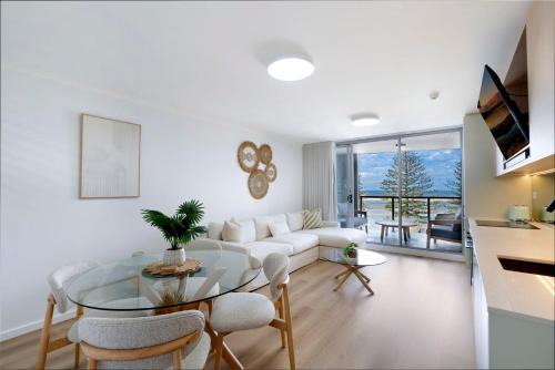 The Entrance Apartment | Waterfront, Pool, Balcony, Prime Location