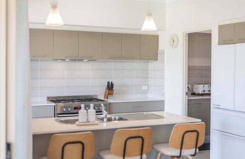 Yamba House | 20 Taine - Oceanstays - Pet-Friendly Waterfront Escape with Fireplace