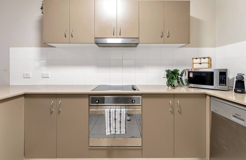 Cairns North Apartment | 2bedroom luxury apartment- steps to the esplanade. Coffee machine and 2 pools!