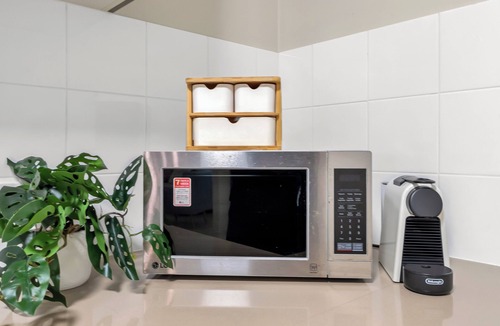 Cairns North Apartment | 2bedroom luxury apartment- steps to the esplanade. Coffee machine and 2 pools!