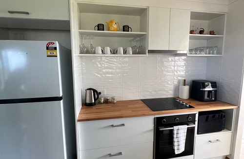 Woolgoolga House | 3 bedroom cottage with ocean views fully furnished with ample space for the kids