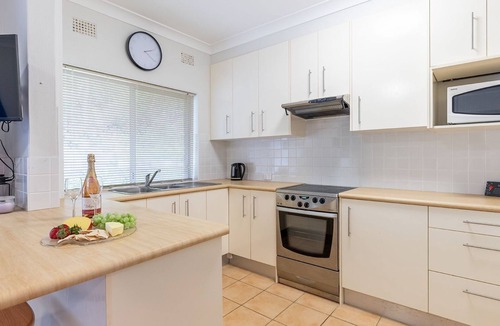 Shoal Bay Apartment | Adriana, 4/83 Ronald Avenue - open plan living with backyard