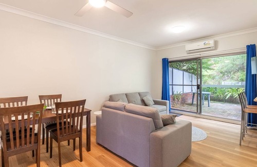 Shoal Bay Apartment | Adriana, 4/83 Ronald Avenue - open plan living with backyard