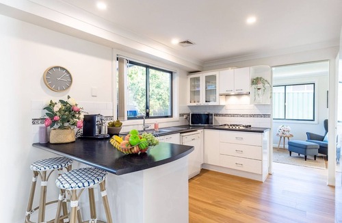Shoal Bay House | Akoya House 122 Tomaree Rd Pet friendly linen air conditioning WiFi and boat parking