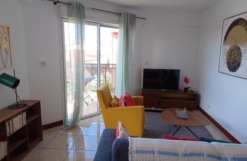 Cayenne Apartment | Appartement NANA A 34 - Appartement Cosy et Lumineux - Vue Panoramique- Centre ville- - Cuisine équipée- CLIM- WIFI - NETFLIX-Parking Public Gratuit-Garage privé payant