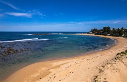 Blue Bay Apartment | Beachfront Bliss for Two l Nova Escapes