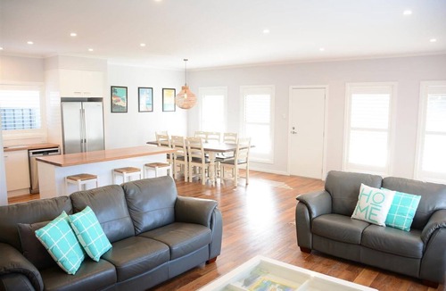 Waterhouse House | Bells On Frome - Coastal shutters, wood fire and the coastal charm.