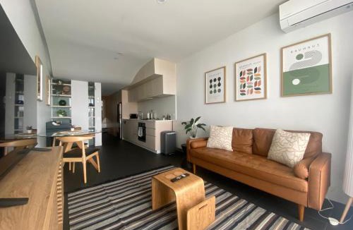City West Apartment | Boutique Canberra Stay - Balcony - Desk