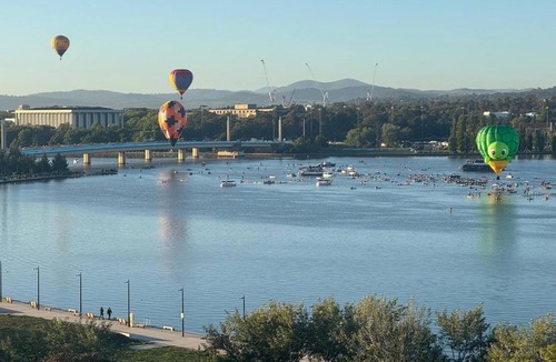 City West Apartment | Boutique Canberra Stay - Balcony - Desk