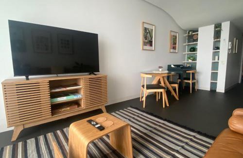 City West Apartment | Boutique Canberra Stay - Balcony - Desk