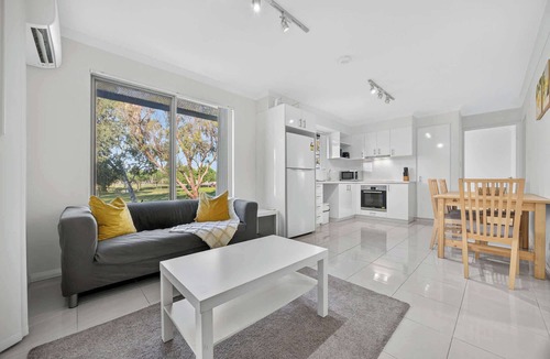 Rockingham Apartment | Bright 2BR Apartment with Garden Views