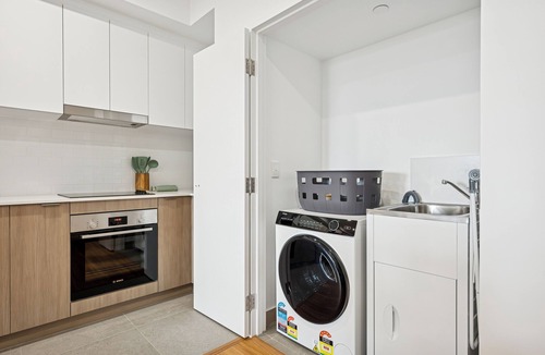 Cannington Apartment | Cannington Comfort – Beside Carousel & Curtin, featuring modern design and rooftop amenities.