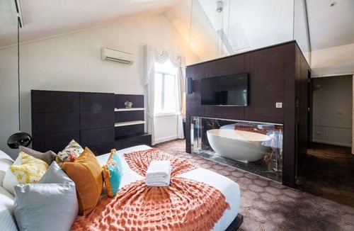 East Melbourne Apartment | Chanel: Unwind in the heart of Wellington Gardens.