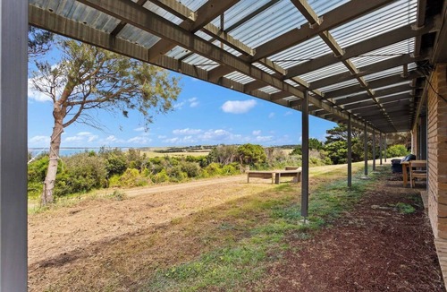Powlett River House | Clifftop Cocoon Swing into Scenic Sea Views