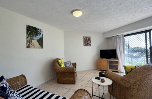 Dicky Beach Apartment | Coastal 2-bedroom apartment at Portobello by the Sea, Dicky Beach. Enjoy ocean glimpses, resort pool, and BBQ area. Sleeps 4 comfortably. Steps from surf, cafes, and shops. Perfect for a relaxing Sunshine Coast holiday.