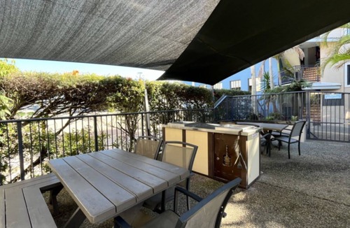 Dicky Beach Apartment | Coastal 2-bedroom apartment at Portobello by the Sea, Dicky Beach. Enjoy ocean glimpses, resort pool, and BBQ area. Sleeps 4 comfortably. Steps from surf, cafes, and shops. Perfect for a relaxing Sunshine Coast holiday.