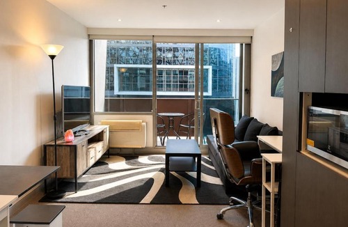 Melbourne Central Business District Apartment | Compact Stay with Balcony, Rooftop & Gym