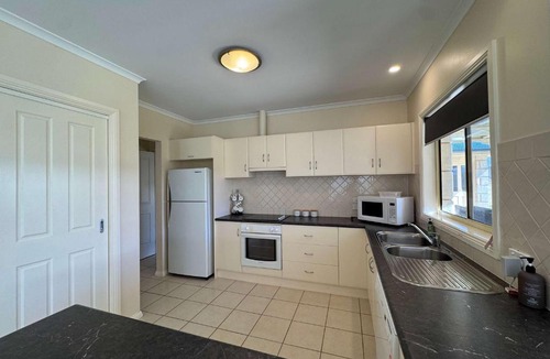 Waterhouse House | Dean's on McQueen - Pet Friendly Outside