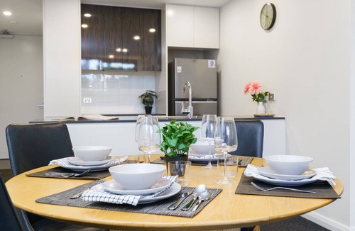 Barton Apartment | Elevated Stay with Refined Interiors and Courtyard