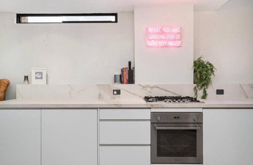 Collingwood Apartment | Enjoy Cafe Culture From Chic Warehouse Conversion