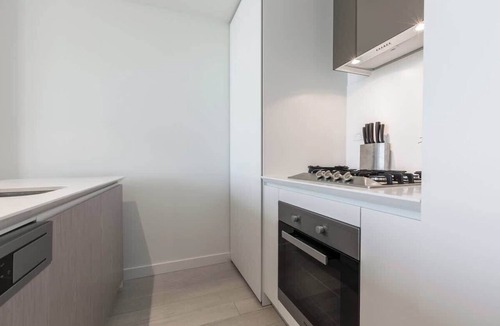 Melbourne Central Business District Apartment | EQ Tower Apartment with View of City Skyline
