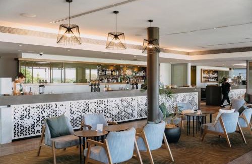 Magenta Shores House | Fairway Retreat