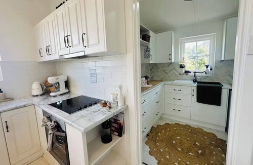 Port Lincoln House | French provincial style duck stone cottage.