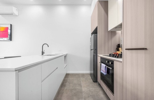 Dickson Apartment | Fresh 2BR Stay | Parking | 7min Walk to Tram