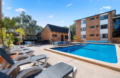 Coffs Harbour Apartment | Ground floor quiet garden balcony heated pool @223