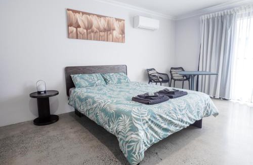 Vasse House | Guest Room with Ensuite & Private Entrance by P2 Living