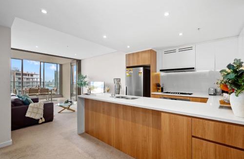 Wentworth Point Apartment | High-Rise Haven with Spectacular Skyline Views