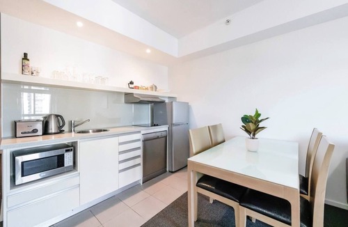 Darwin City Centre Apartment | Inner Bloom Tropical Chic in the CBD with Pool