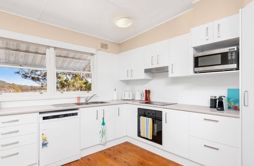 Shoal Bay Cottage | Jen's Place. a charming vintage cottage that embodies the essence of classic coastal living.
