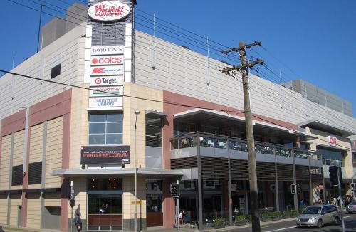 Burwood Apartment | KozyGuru | Burwood | City Skyline – Steps to Train